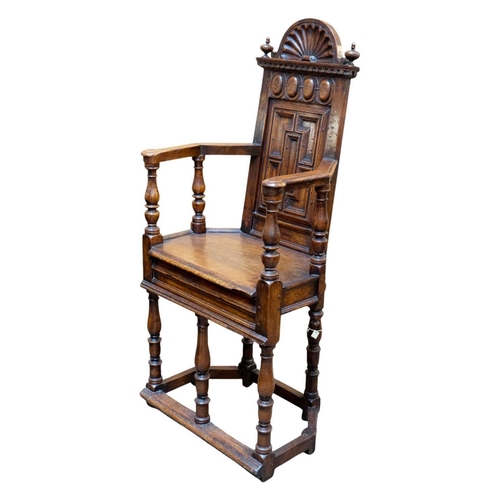 1003 - A matched pair of French Renaissance walnut caquetoire chairs. Circa 1570, the backs with arched cre... 