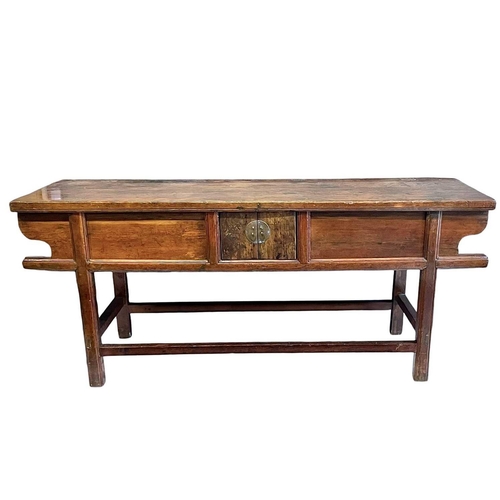 1013 - A Chinese stained pine side table/cabinet. Qing, 19th century, fitted with a central cupboard flanke... 