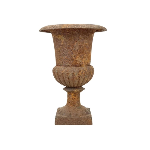 103 - A cast iron campana urn. On square base, height 24.5cm.