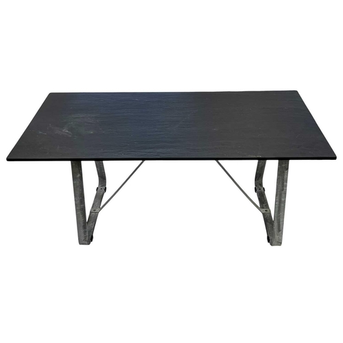 1036 - Robin Day (1915-2010), A Sussex Tavolo table. With a natural slate top on a galvanised steel base, h... 