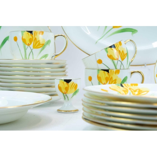 1039 - A Paragon china part breakfast service. Hand painted with a crocus design and comprising 12 plates, ... 