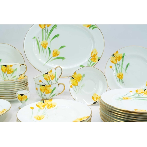 1039 - A Paragon china part breakfast service. Hand painted with a crocus design and comprising 12 plates, ... 