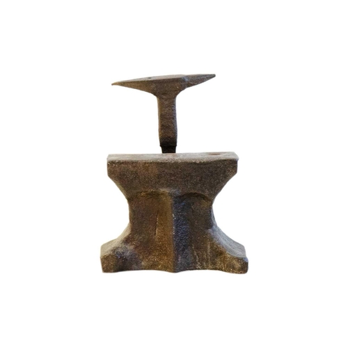 1043 - A cast iron anvil. 16th/17th century, height 22.5cm, together with another smaller anvil (2). Mollie... 