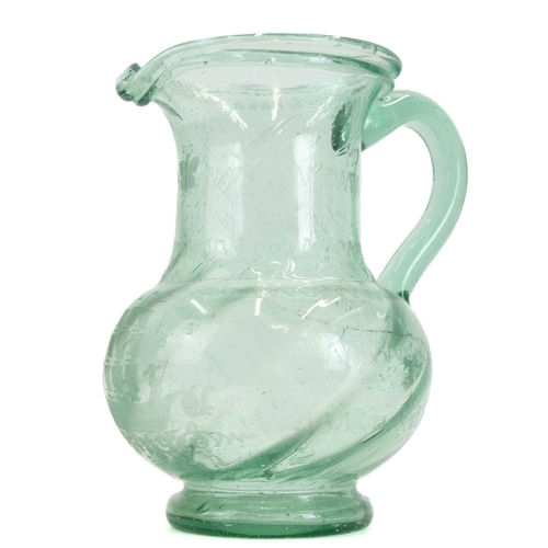 1045 - A Continental blown glass water jug. Etched with a sailing ship, height 25cm, together with a glass ... 