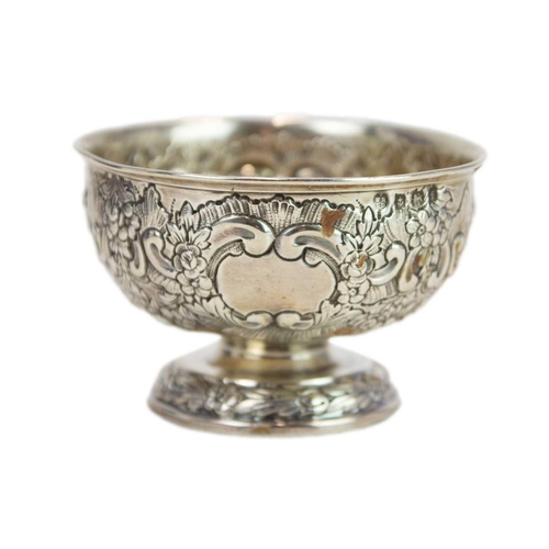 1047 - An Edwardian silver sugar bowl. With repousse decoration, By Williams, Birmingham, 1905, together wi... 