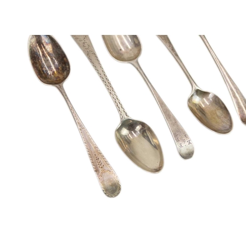 1048 - Nine assorted Georgian silver teaspoons. Mixed dates and makers, some with bright cut decoration, 11... 