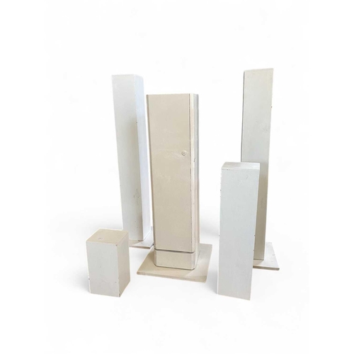 1054 - A pair of white painted display plinths. Height 117cm, and three others various (5)