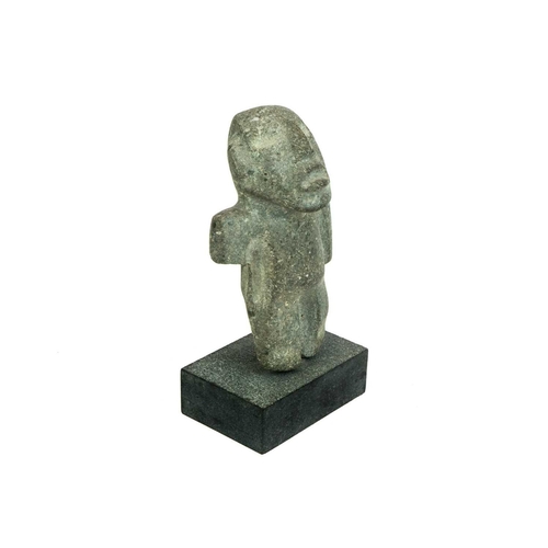 1060 - A Mezcala standing figure. Mexico 600BC-200AD, height 14.5cm, on a stand overall height 17cm. From P... 