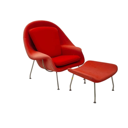 1061 - Designed by Eero Saarinen (1910-1961) A Womb chair and ottoman. Upholstered in a red Danish wool fab... 