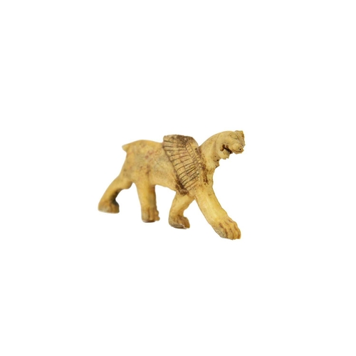 1062 - A Phoenician bone plaque of a winged lion. Syria, 1000-800BC, height 3.4cm, length 6.9cm. Artemissio... 