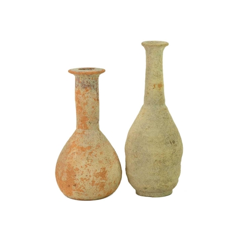 1063 - A Roman terracotta flask. Height 13.5cm, another similar flask and a Neolithic twin-handled vessel, ... 