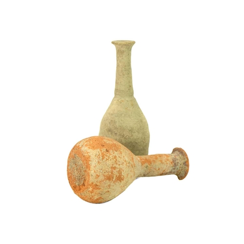 1063 - A Roman terracotta flask. Height 13.5cm, another similar flask and a Neolithic twin-handled vessel, ... 