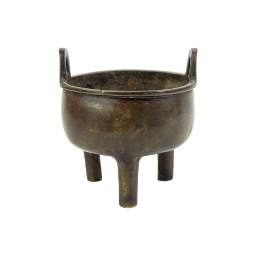 1064 - A Chinese bronze ding tripod censer. Late Qing, plain form with loop handles, Xuande mark, height 12... 