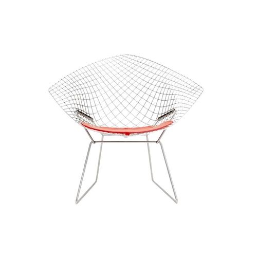 1092 - After Harry Bertoia a pair of 'Diamond' armchairs. Modern, of wire mesh construction, with red padde... 