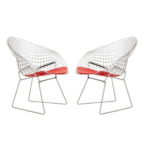 1092 - After Harry Bertoia a pair of 'Diamond' armchairs. Modern, of wire mesh construction, with red padde... 