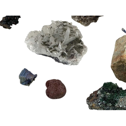 1099 - A collection of minerals. Including copper and iron specimens, quartz, and others. Mollie and Graham... 