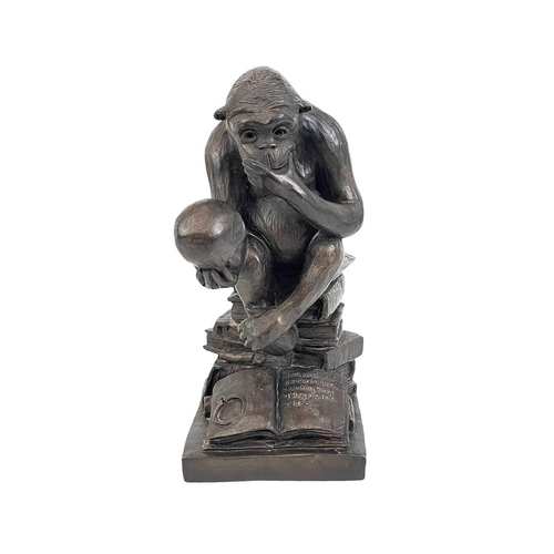 11 - A resin model of Darwin's ape. Height 33cm.