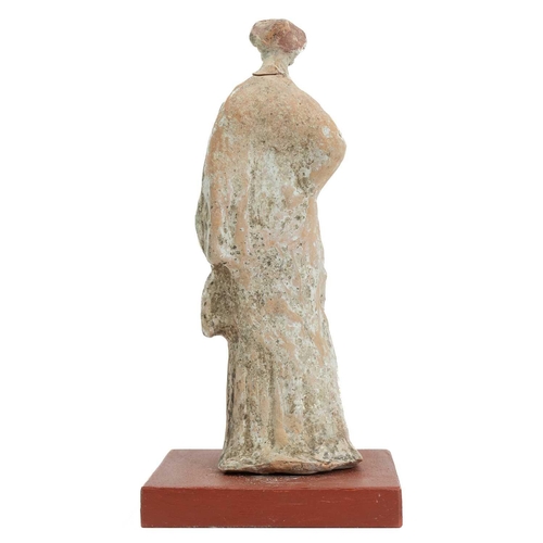 1101 - A Greek Tanagra figure. 400-300 BC, modelled as a classical female, traces of white pigment, height ... 