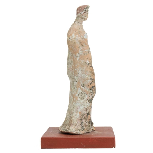 1101 - A Greek Tanagra figure. 400-300 BC, modelled as a classical female, traces of white pigment, height ... 