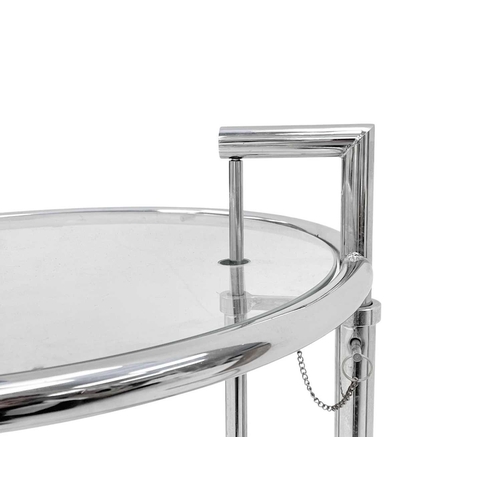 1116 - Eileen Gray, A pair of chrome and glass E1027 tables. Modern, with rise and fall glass tops, on hors... 