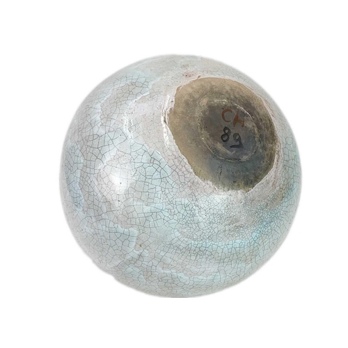 1122 - Christa Maria HERRMANN (b.1945). A large raku glazed globular jar, incised initials and 89, height 3... 