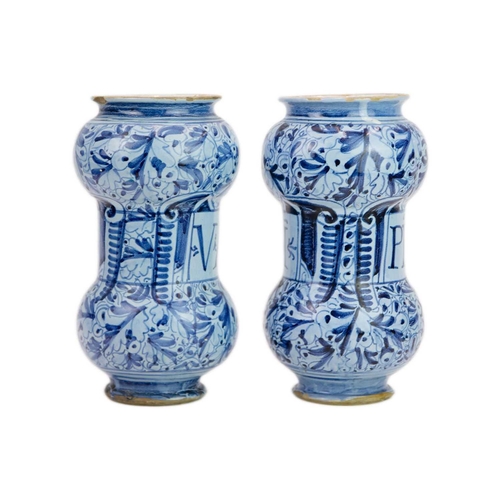 1131 - A matched pair of Italian Maiolica albarelli or dry drug jars. Probably Venetian, early 17th century... 