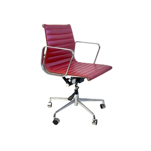 1140 - An Eames 'EA117 Aluminium Group' desk chair. After a design by Charles and Ray Eames, modern, with a... 