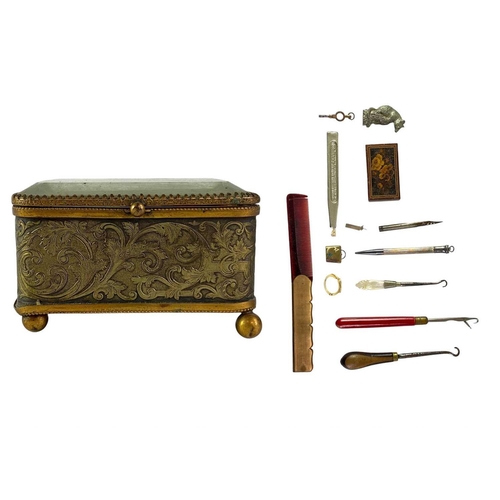 115 - A collection of curiosities, contained in a French glass topped brass casket. Including a Tunbridgew... 