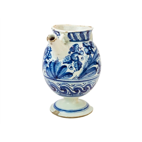 1155 - A North Italian blue and white Maiolica wet drug or syrup jar. 17th century, with floral painted dec... 