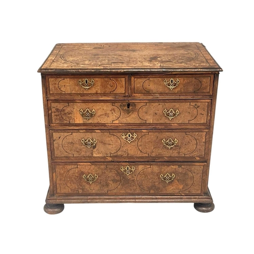 1158 - A Queen Anne figured walnut, chevron banded and ebony strung chest. Of two short and three long, on ... 