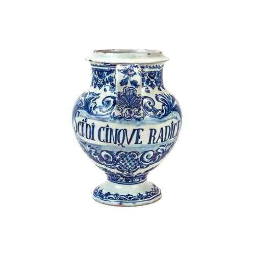 1165 - An Italian blue and white Maiolica wet drug or syrup jar. Early 18th century, with foliate scroll de... 