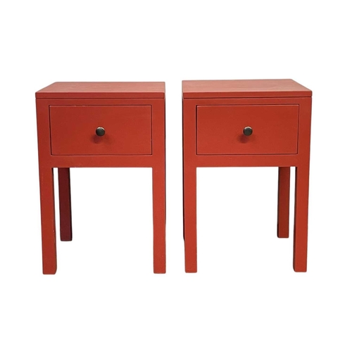 1168 - A pair of red painted oak bedside tables. Modern, each fitted a drawer, on square legs, height 60cm,... 