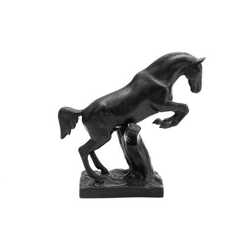 117 - A 20th century Russian cast iron model of a leaping horse. Impressed marks to base, height 19cm.