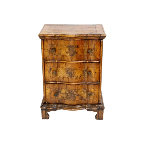 1179 - An Italian walnut and crossbanded prie dieu chest Mid 18th century, with a double serpentine front f... 