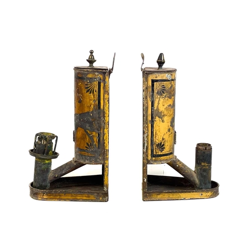 119 - A pair of toleware Argand lamps. Early 19th century, with stencil and painted finish, the brass fitt... 