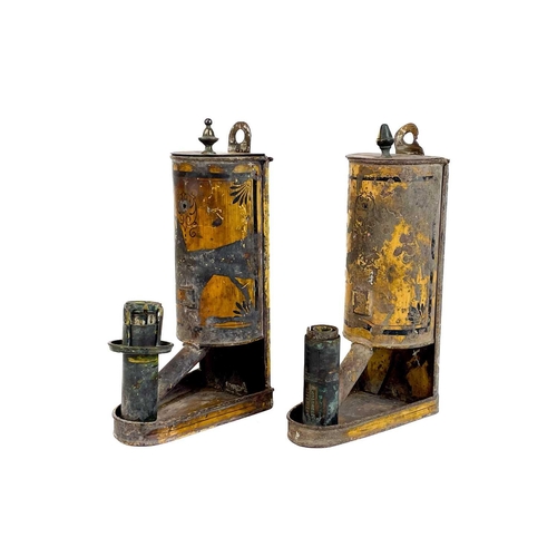 119 - A pair of toleware Argand lamps. Early 19th century, with stencil and painted finish, the brass fitt... 