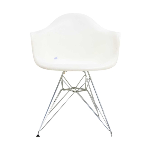 1196 - After Charles and Ray Eames, four DAR style armchairs. White plastic moulded shells on chrome Eiffel... 