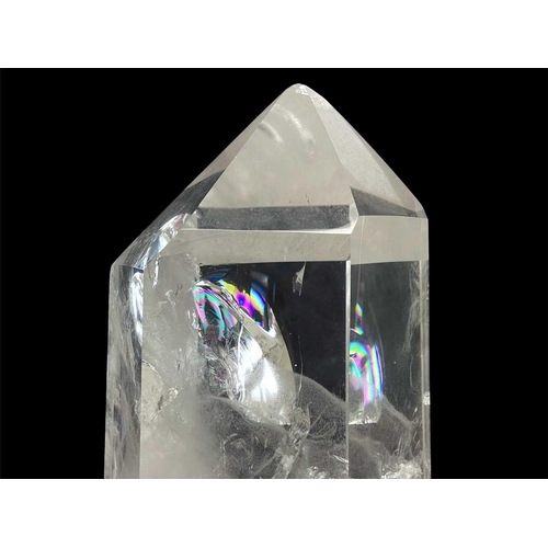 128 - A large quartz rainbow point. Cut and polished, with rose hue inclusions, height 21cm width 10cm dep... 