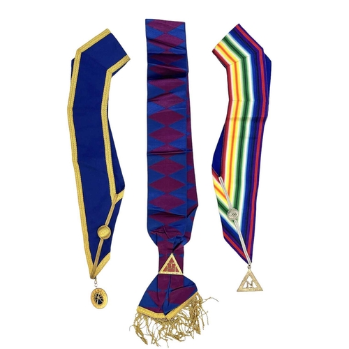 135 - Masonic regalia and jewels, contained in a leather case. Including two Free Masonic Aprons, medals, ... 