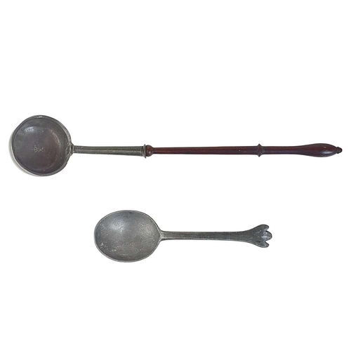 140 - A pewter dog nose spoon and a pewter ladle with fruitwood handle The spoon early 18th century, the t... 