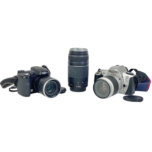 147 - A Canon EOS 300 camera. With a 28-90mm Zoom lens1:4-5.6, together with a 75-300 mm zoom lens, two ca... 