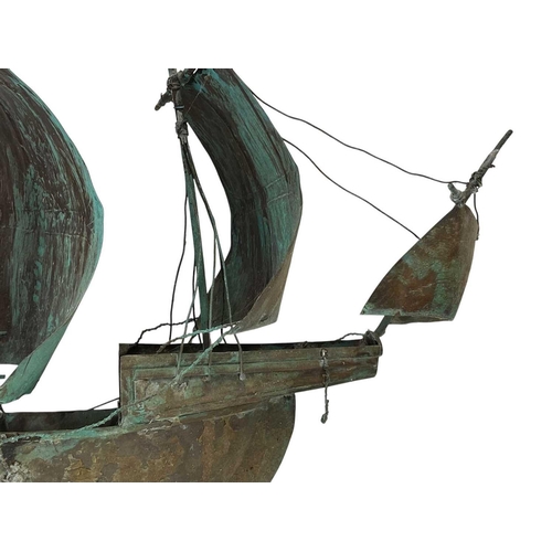 148 - A copper galleon weather vane mount. Early 20th century, the three masted ship with verdigris patina... 