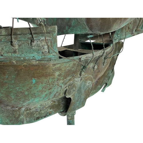 148 - A copper galleon weather vane mount. Early 20th century, the three masted ship with verdigris patina... 