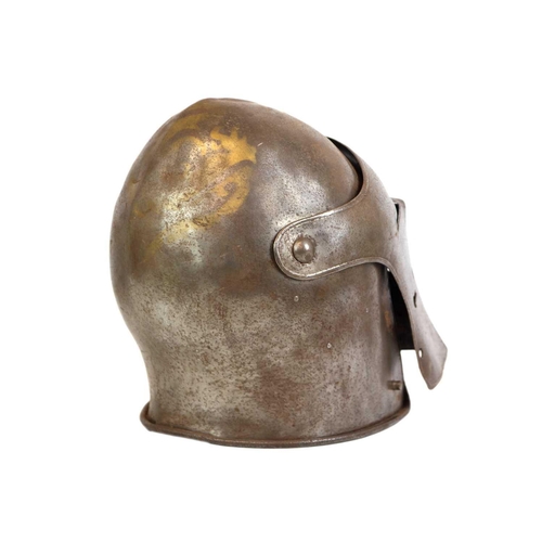 158 - A reproduction polished steel Barbuta style helmet. With a hinged visor, length 32cm, together with ... 