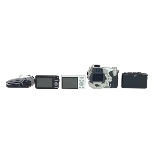 159 - A Minolta Dimage 7i digital camera. Other cameras, including Panasonic Lumix DMC-XS1, Minox 35ML, Ca... 