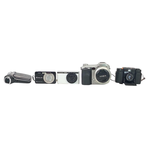 159 - A Minolta Dimage 7i digital camera. Other cameras, including Panasonic Lumix DMC-XS1, Minox 35ML, Ca... 