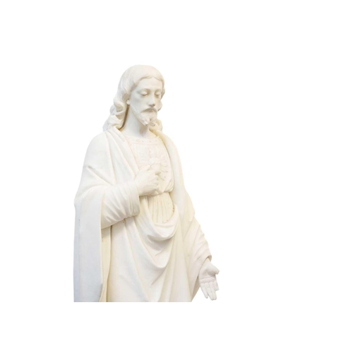 165 - A large marble figure of the Sacred Heart of Jesus. Probably Italian, 20th century, height 97cm toge... 