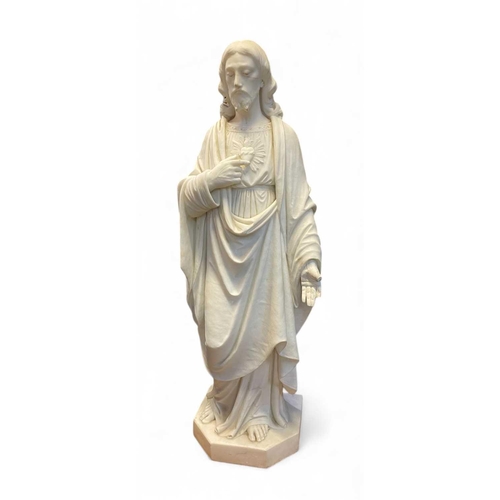 165 - A large marble figure of the Sacred Heart of Jesus. Probably Italian, 20th century, height 97cm toge... 