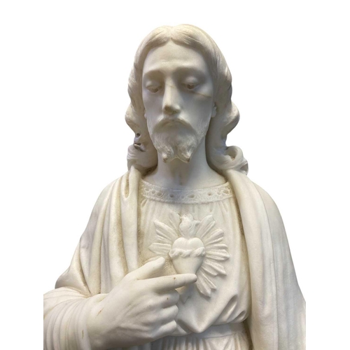 165 - A large marble figure of the Sacred Heart of Jesus. Probably Italian, 20th century, height 97cm toge... 