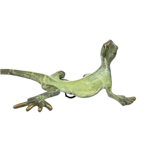 173 - A Michael Storey bronze of a lizard or Gekko. Length 18cm.